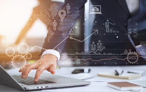 Businessman working using laptop computer with strategy and growth of business on screen